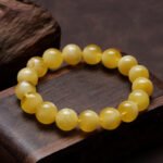 Natural Butterscotch Amber Beeswax Bracelet | Solar Plexus Gem for Warmth & Grounding Energy - Image 2