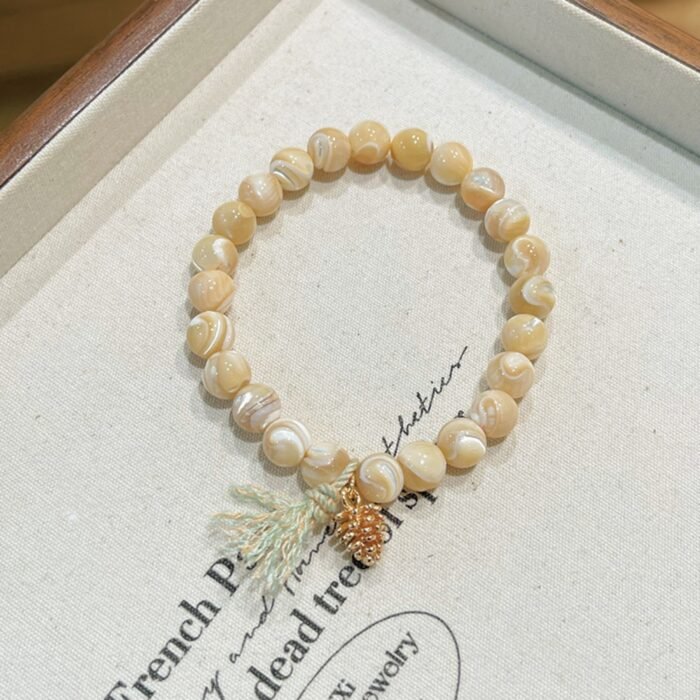 Natural Milk Tea Trochus Shell Bead & Pinecone Charm Bracelet | Ocean-Inspired Healing & Abundance Jewelry - Image 7