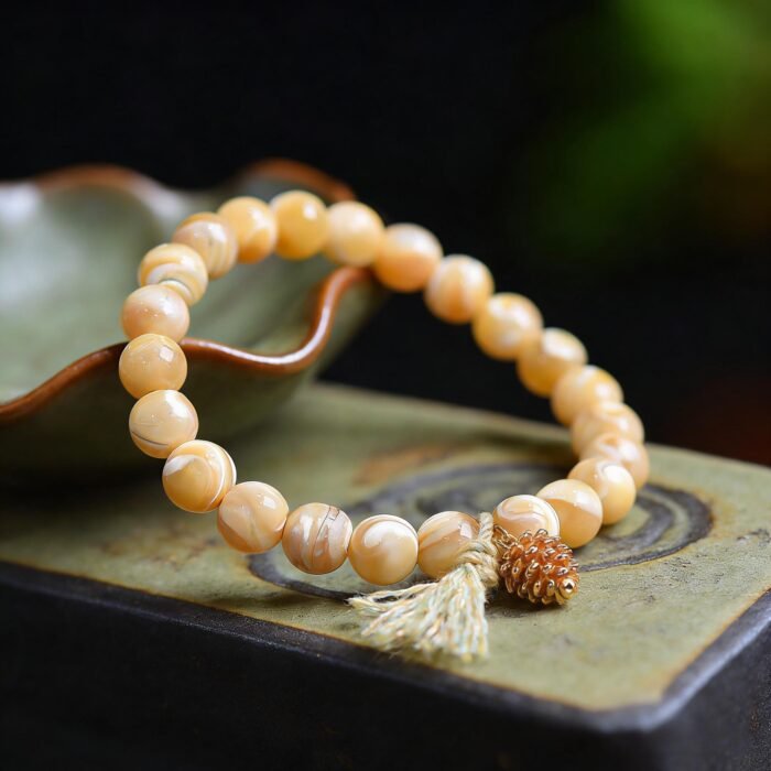 Natural Milk Tea Trochus Shell Bead & Pinecone Charm Bracelet | Ocean-Inspired Healing & Abundance Jewelry - Image 2