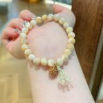 Natural Milk Tea Trochus Shell Bead & Pinecone Charm Bracelet | Ocean-Inspired Healing & Abundance Jewelry - Image 6