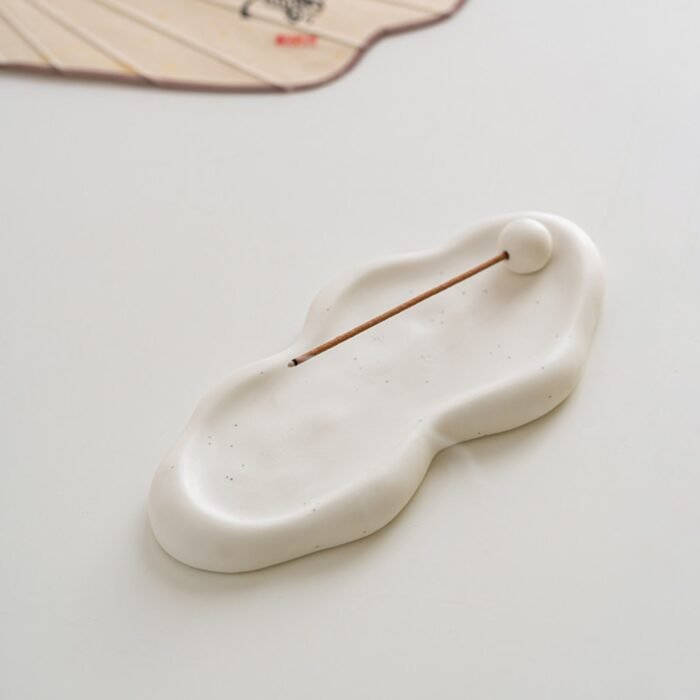 1_3b8110ca5f1df20319bf704fad09bc70 Minimalist Cloud Shape Incense Holder - White & Black Ceramic Incense Tray for Home Decor - Image 1